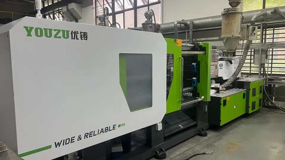 Real injection molding machine inside XIN JIE caster wheel factory